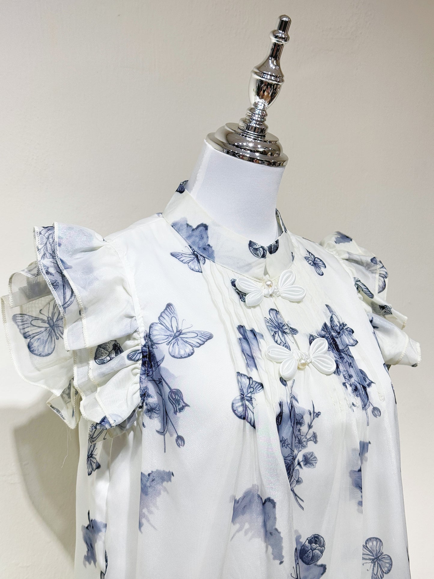 Navy Printed Flutter Sleeve Babydoll Top