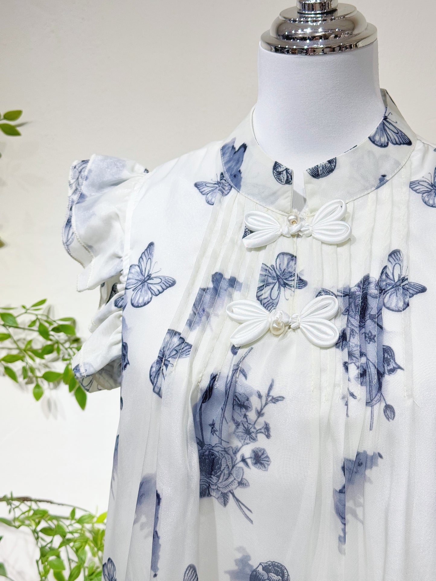 Navy Printed Flutter Sleeve Babydoll Top