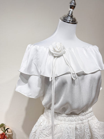 Ruffled Off-Shoulder Satin Top with Rose Brooch